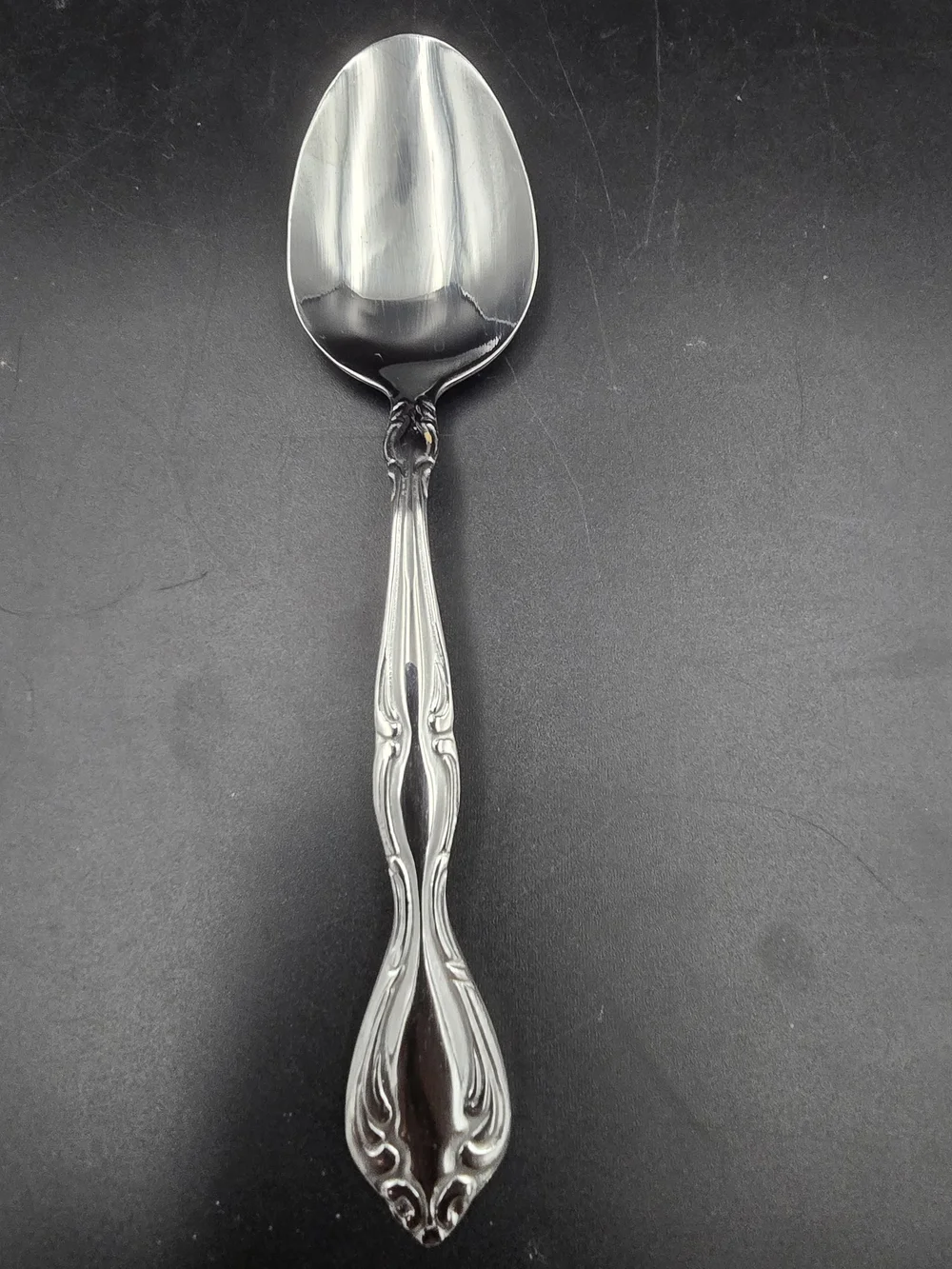 Oneida Silver Tone Ornate Serving Spoon